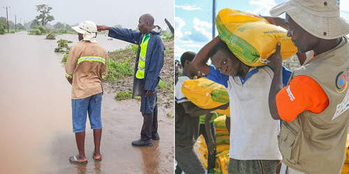 Männer stehen auf einer überfluteten Straße in Mosambik und zwei Helfer tragen Hilfsgüter